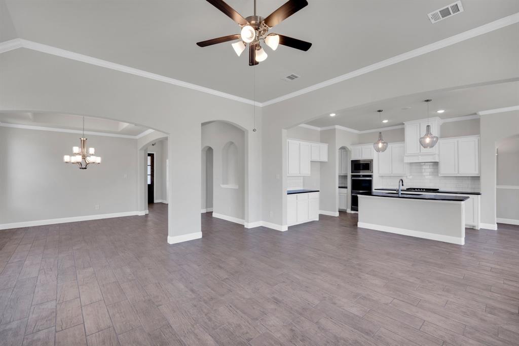 395 Haven Road Waxahachie, TX 75165 - Photo 5 of 40 a view of an empty room and kitchen view
