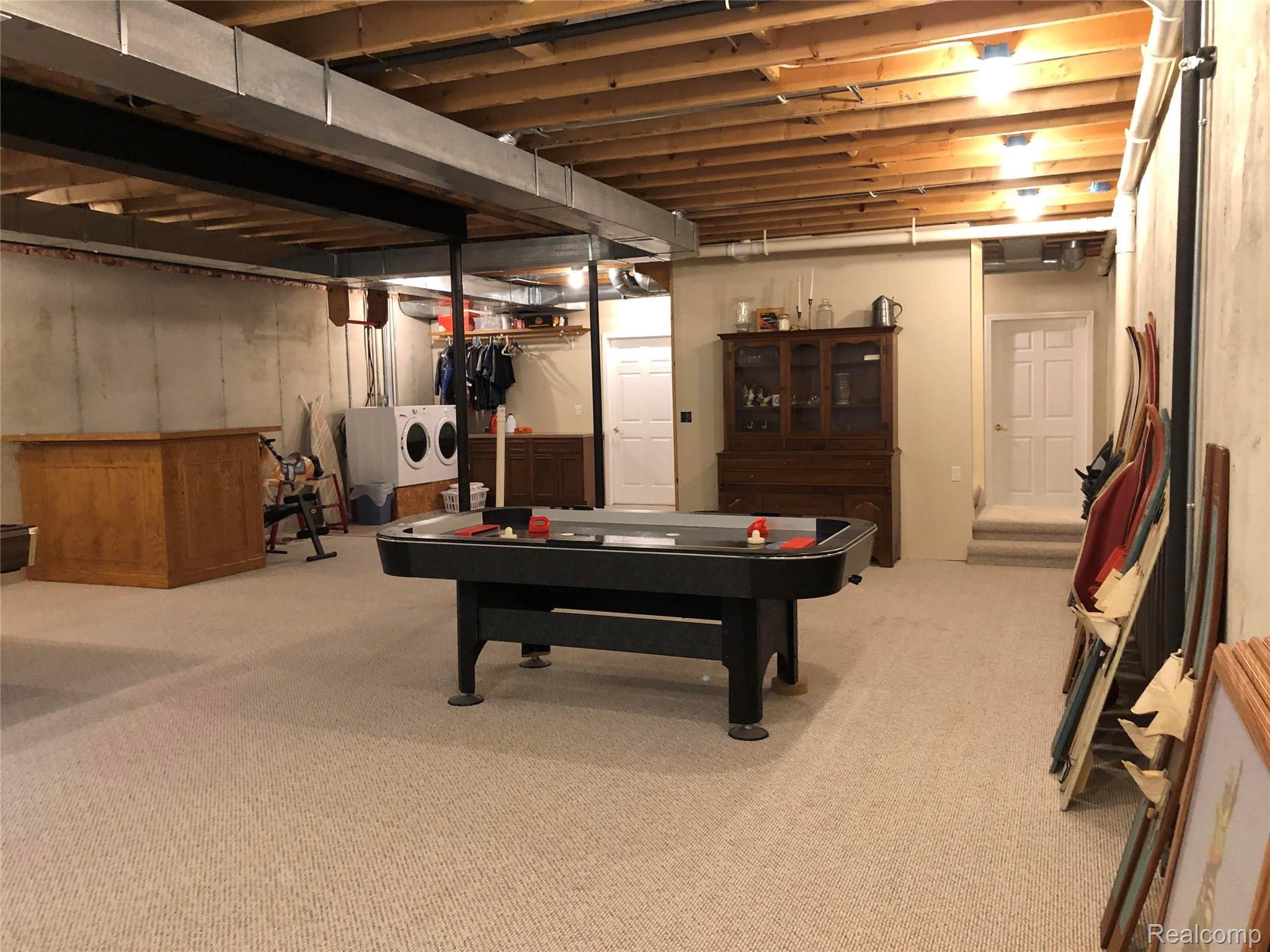 5343 Ridgemont Street Howell, MI 48843 - Photo 20 of 26 large basement rec room area