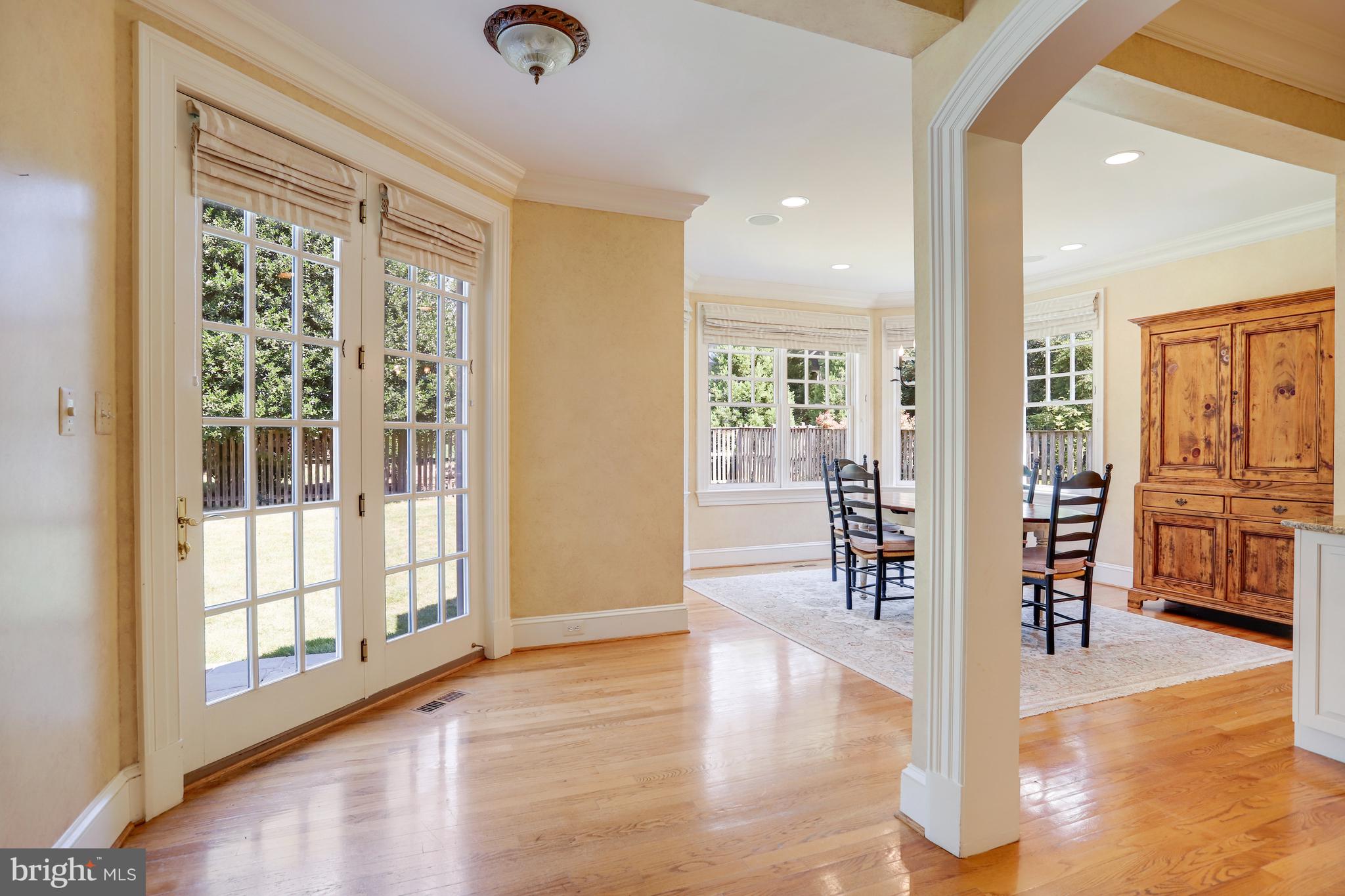 5629 Newington Road Bethesda, MD 20816 - Photo 23 of 65 a view of livingroom with furniture wooden floor and windows