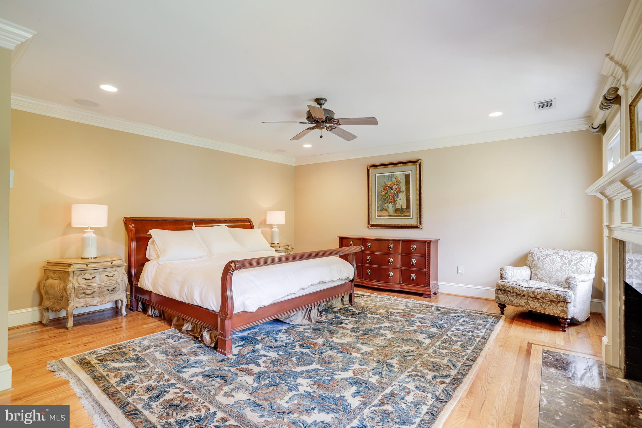 5629 Newington Road Bethesda, MD 20816 - Photo 27 of 65 a bedroom with a bed and a couch