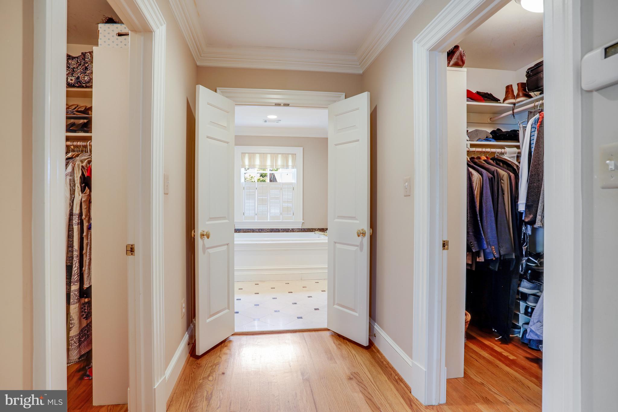 5629 Newington Road Bethesda, MD 20816 - Photo 33 of 65 a view of a hallway with wooden floor and closet