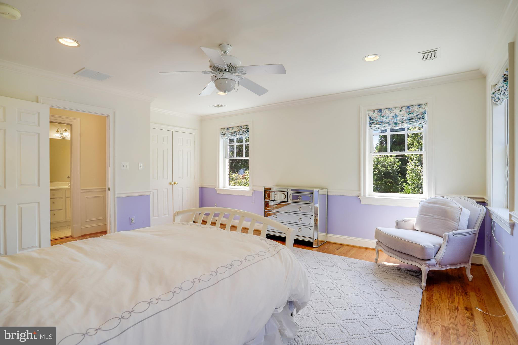 5629 Newington Road Bethesda, MD 20816 - Photo 44 of 65 a bedroom with a bed and a couch