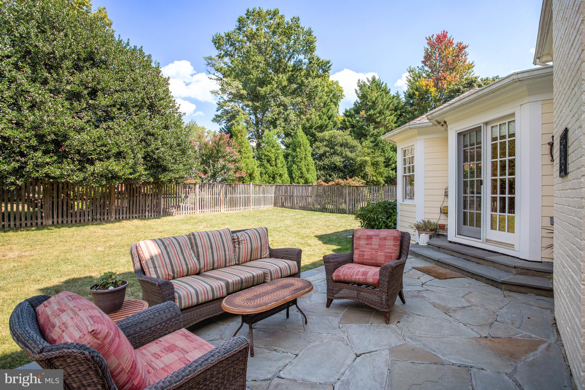 5629 Newington Road Bethesda, MD 20816 - Photo 56 of 65 a outdoor living space with furniture and a potted plant