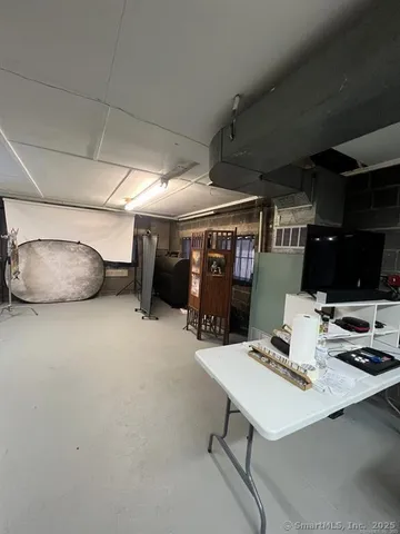 a room with furniture and a table