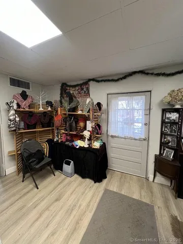 a bed room with a bed and furniture