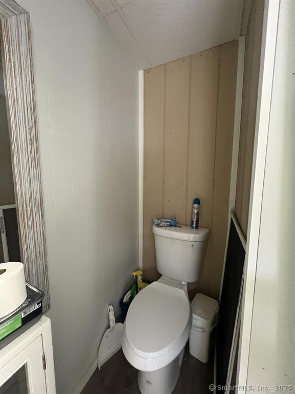 361 Pomeroy Avenue Meriden, CT 06450 - Photo 17 of 25 a white toilet sitting next to a bathroom sink