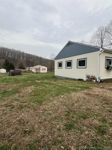 a house view with garden space