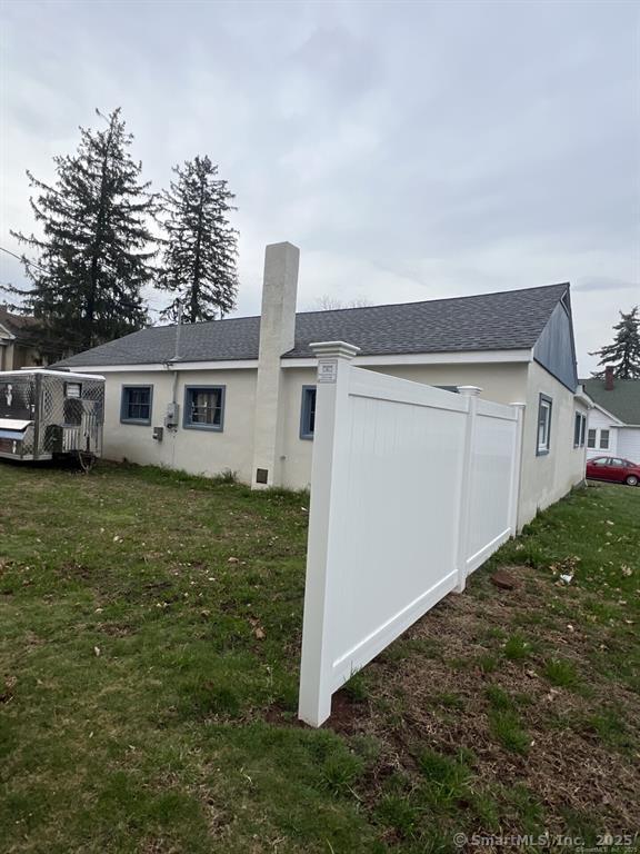 361 Pomeroy Avenue Meriden, CT 06450 - Photo 23 of 25 a backyard of a house with lots of green space