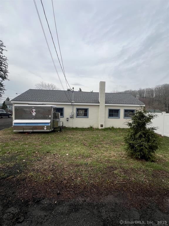 361 Pomeroy Avenue Meriden, CT 06450 - Photo 24 of 25 a front view of a house with a garden