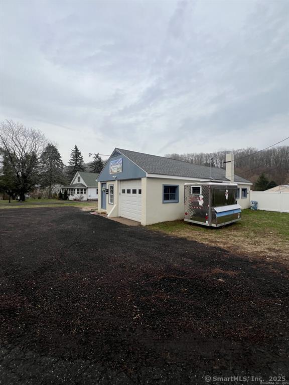 361 Pomeroy Avenue Meriden, CT 06450 - Photo 25 of 25 a aerial view of a house with a yard