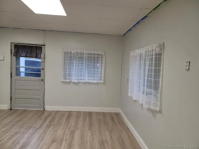 an empty room with windows
