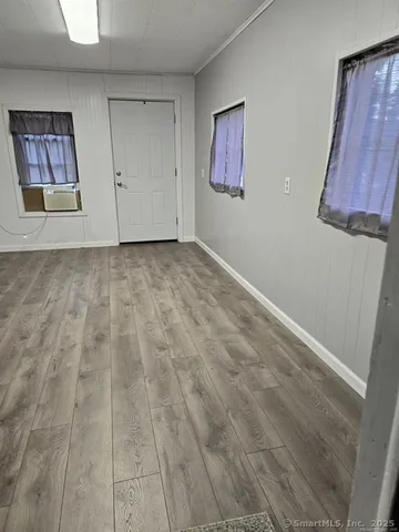 a view of an entryway with window