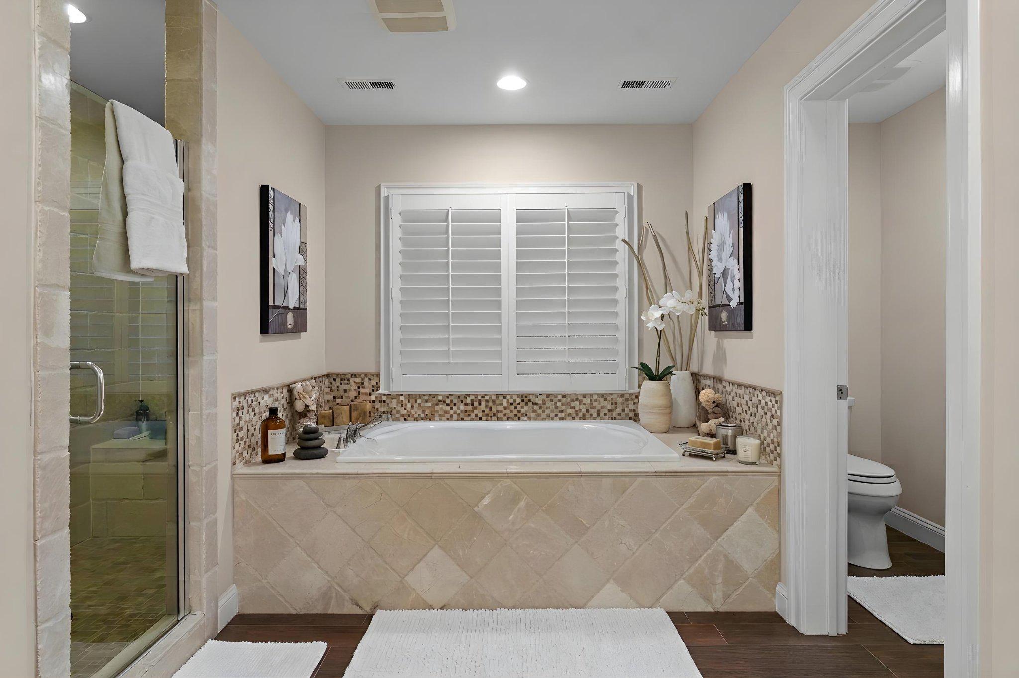 4700 Edgefield Road Bethesda, MD 20814 - Photo 14 of 29 a bath tub sitting in a bathroom next to a window