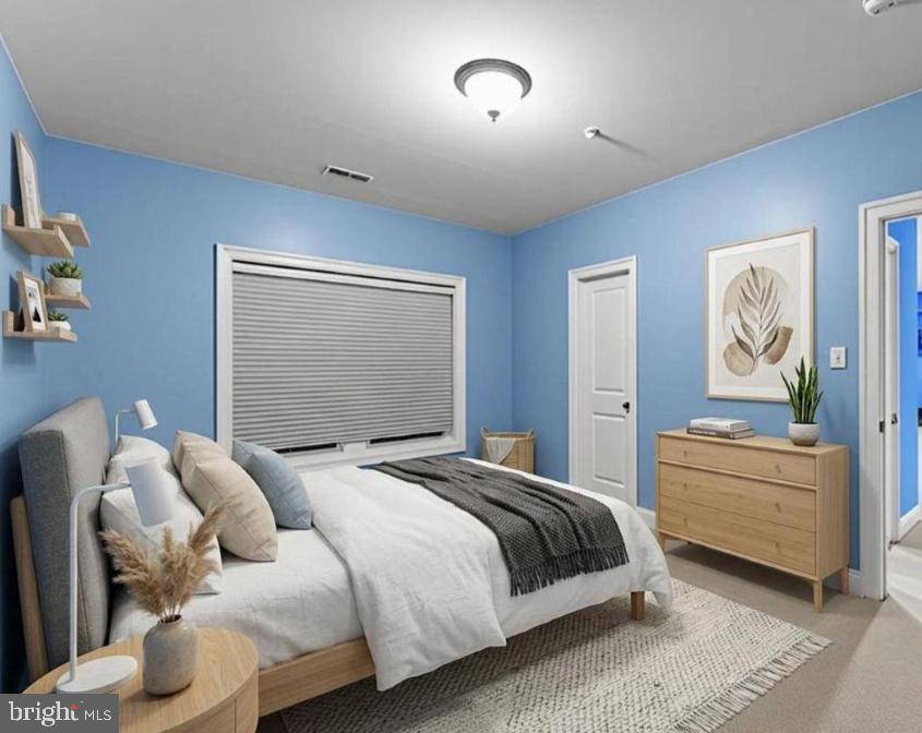 4700 Edgefield Road Bethesda, MD 20814 - Photo 24 of 29 a bedroom with two beds and painting on the wall