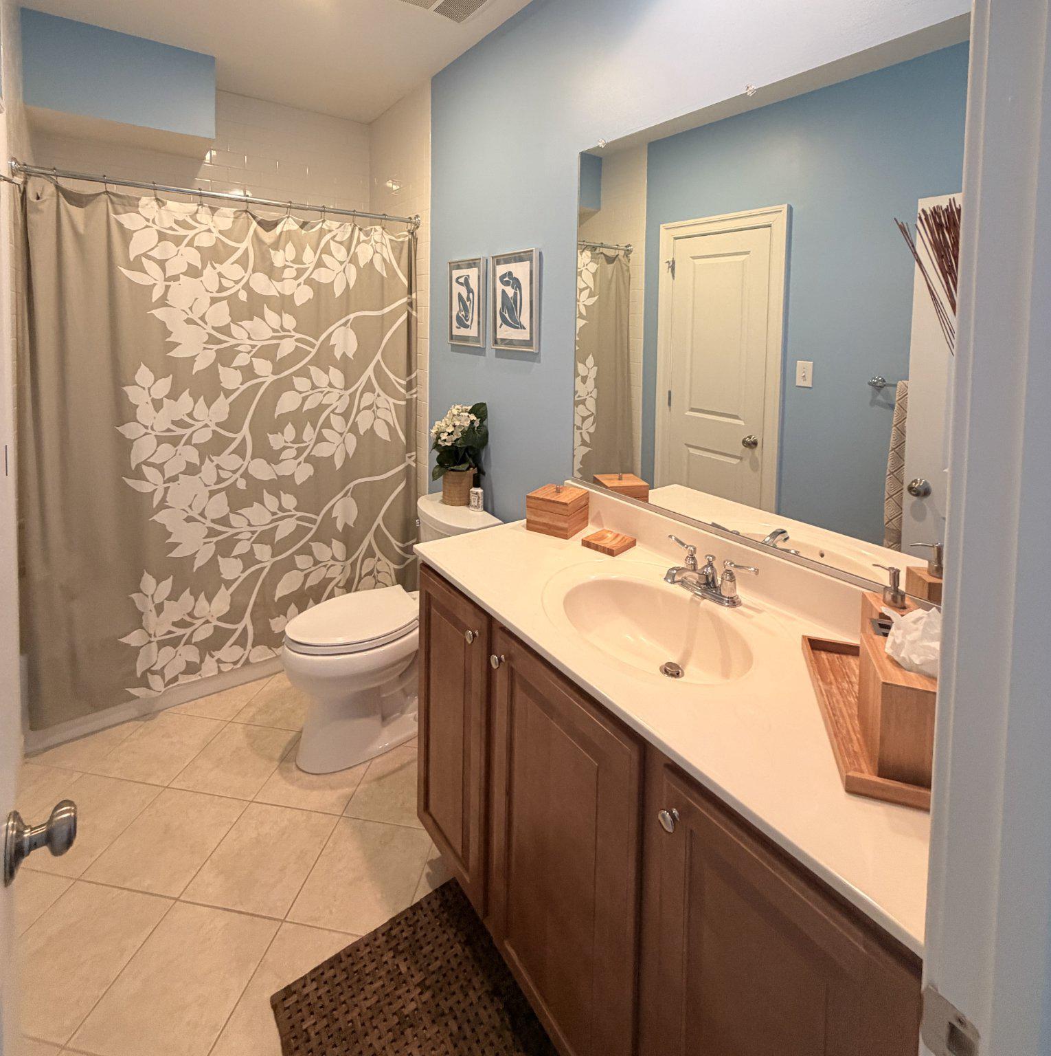 4700 Edgefield Road Bethesda, MD 20814 - Photo 25 of 29 a bathroom with a sink toilet and shower