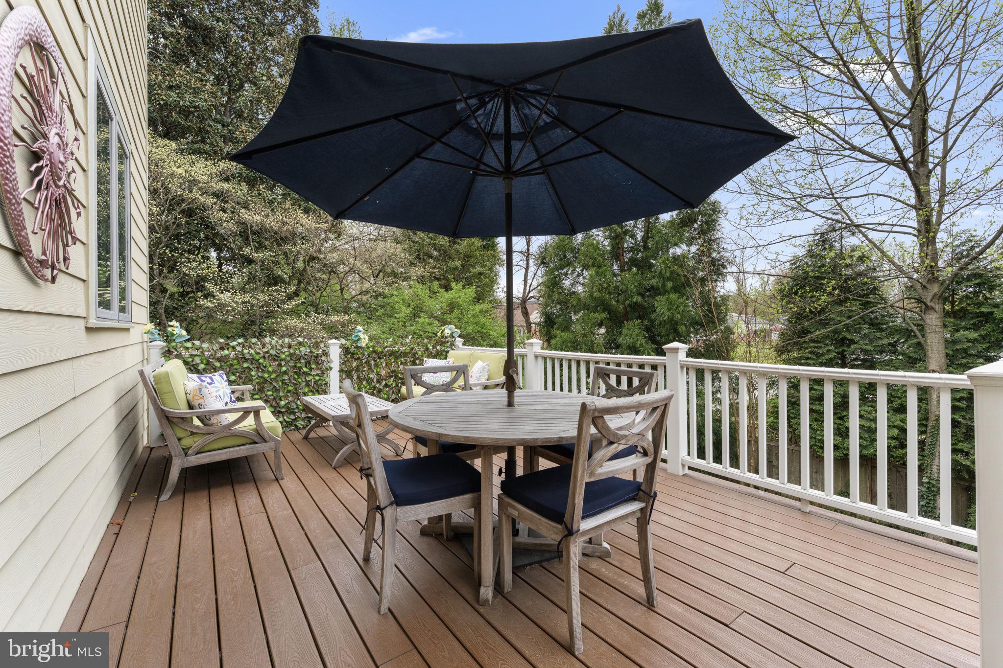 4700 Edgefield Road Bethesda, MD 20814 - Photo 27 of 29 a view of balcony with furniture and wooden floor