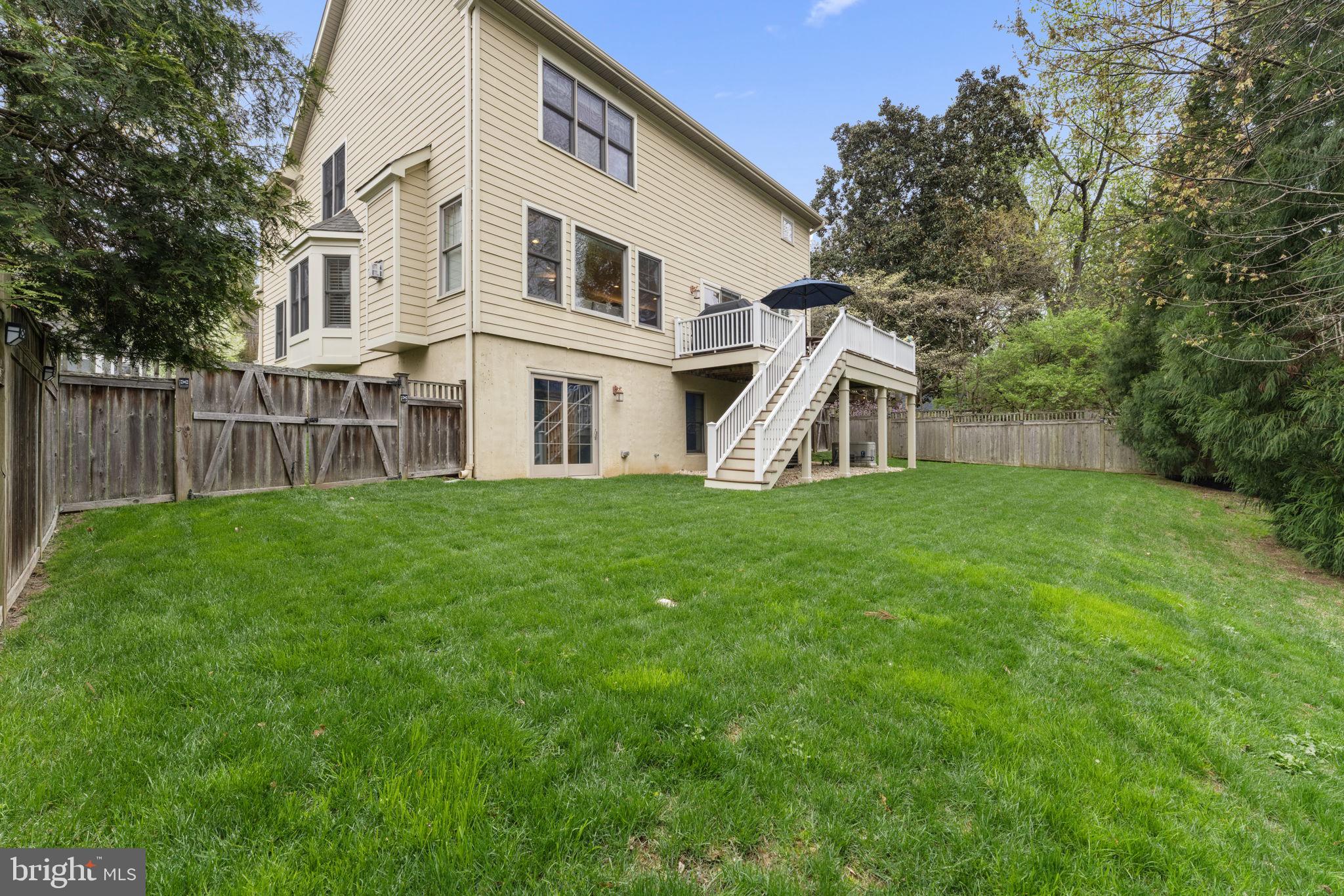 4700 Edgefield Road Bethesda, MD 20814 - Photo 29 of 29 a view of a house with a yard and sitting area