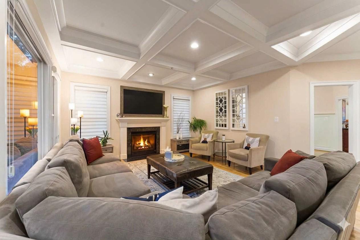 4700 Edgefield Road Bethesda, MD 20814 - Photo 5 of 29 a living room with furniture fireplace and a large window