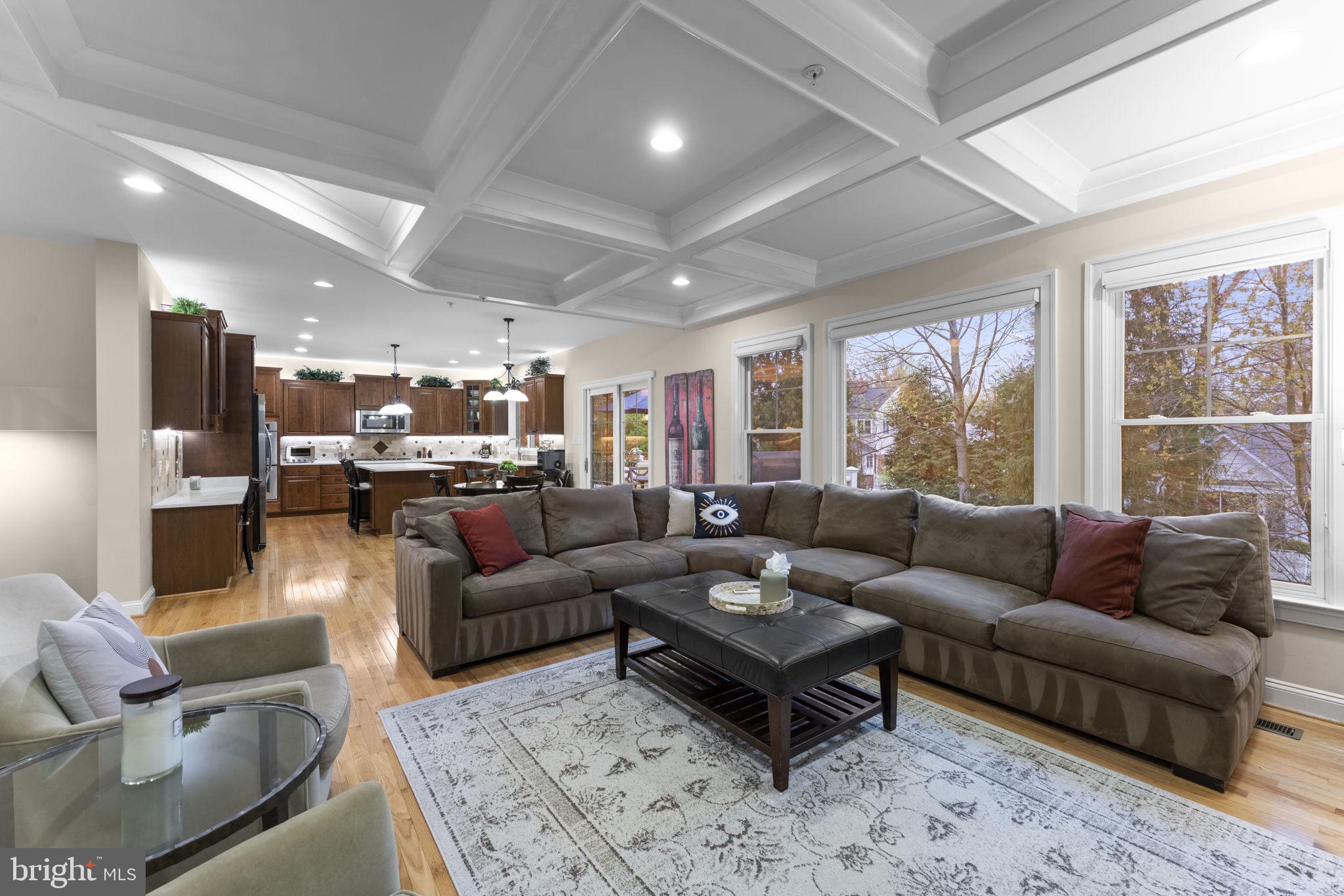 4700 Edgefield Road Bethesda, MD 20814 - Photo 6 of 29 a living room with furniture and a large window