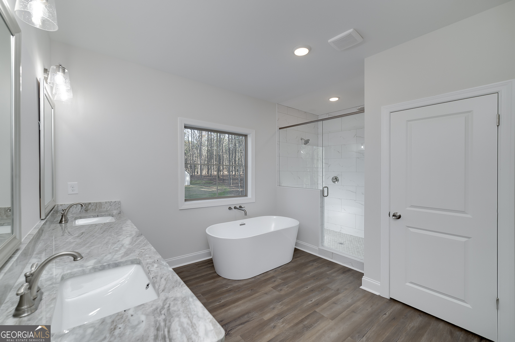 245 Pelican Circle Monticello, GA 31064 - Photo 22 of 37 a spacious bathroom with a bathtub and shower