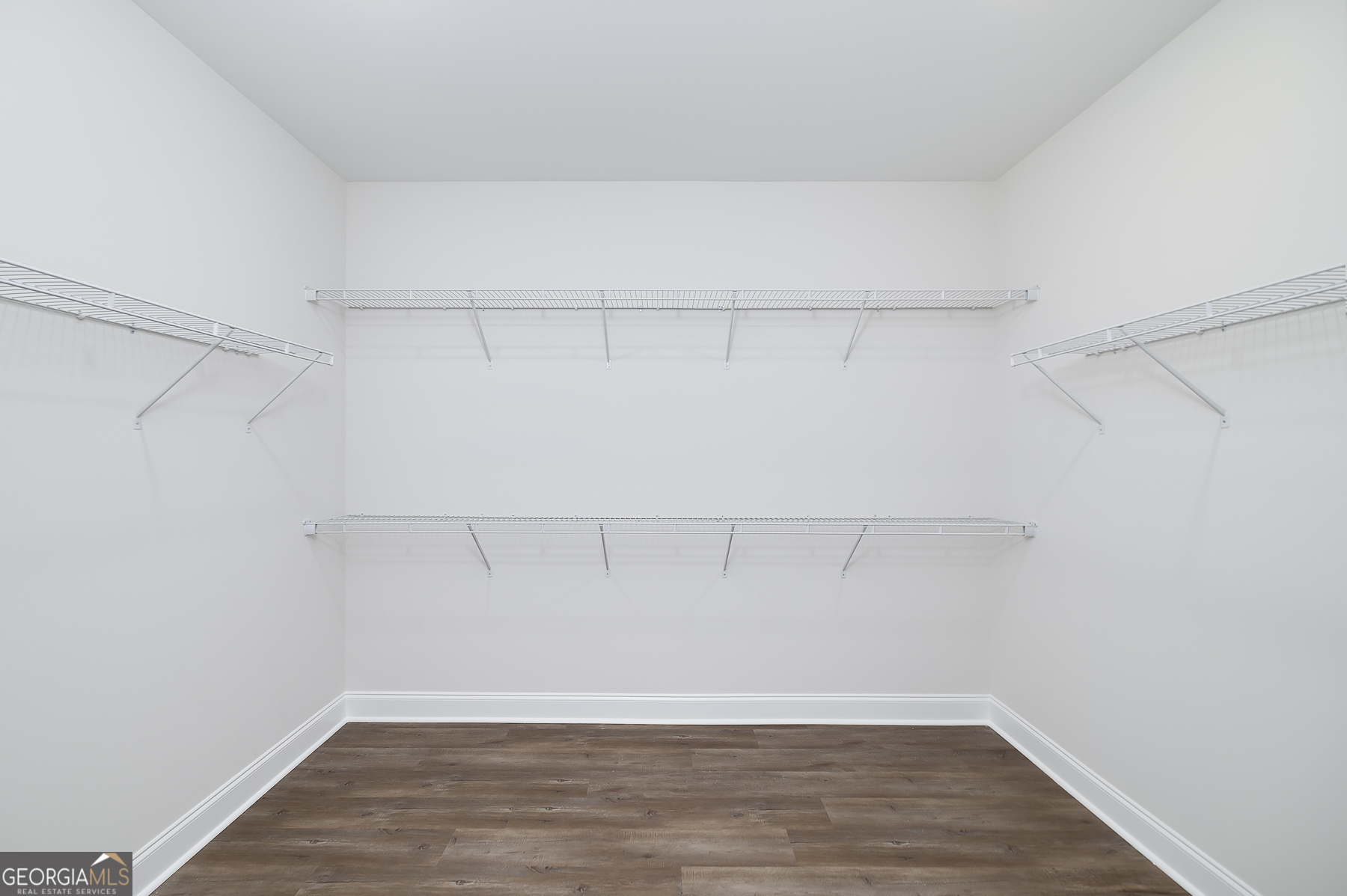 245 Pelican Circle Monticello, GA 31064 - Photo 24 of 37 a view of an empty walk in closet