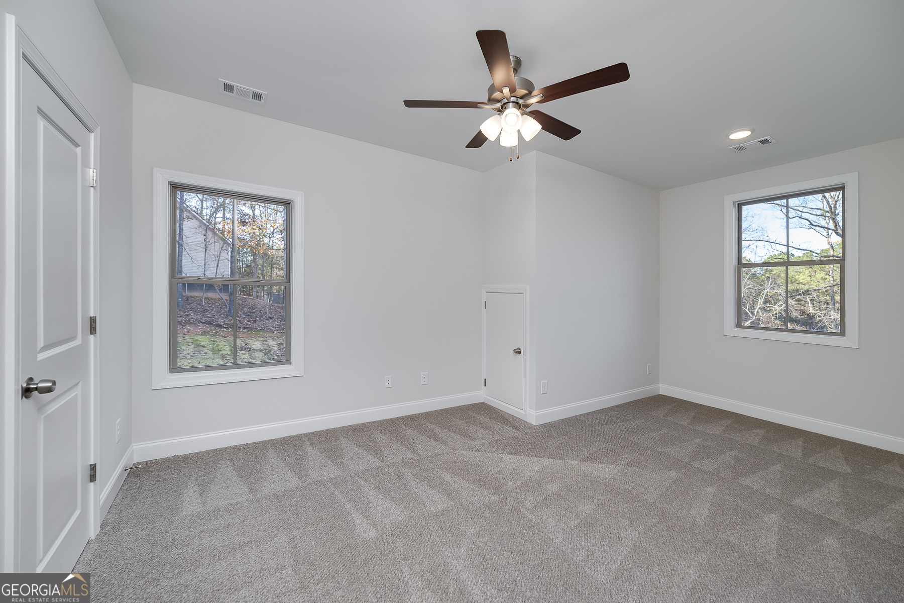 245 Pelican Circle Monticello, GA 31064 - Photo 30 of 37 a view of an empty room with a window