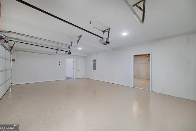 a view of a room with wooden floor and outdoor space