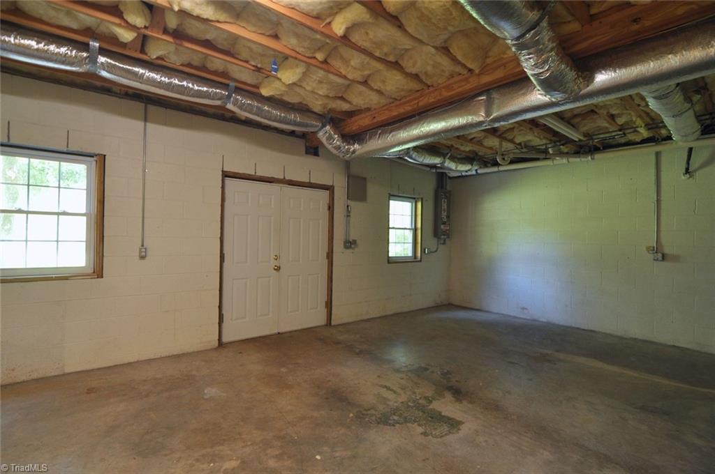 791 Pinewood Road Reidsville, NC 27320 - Photo 16 of 29 Basement Workshop/Storage area with Outdoor Access!