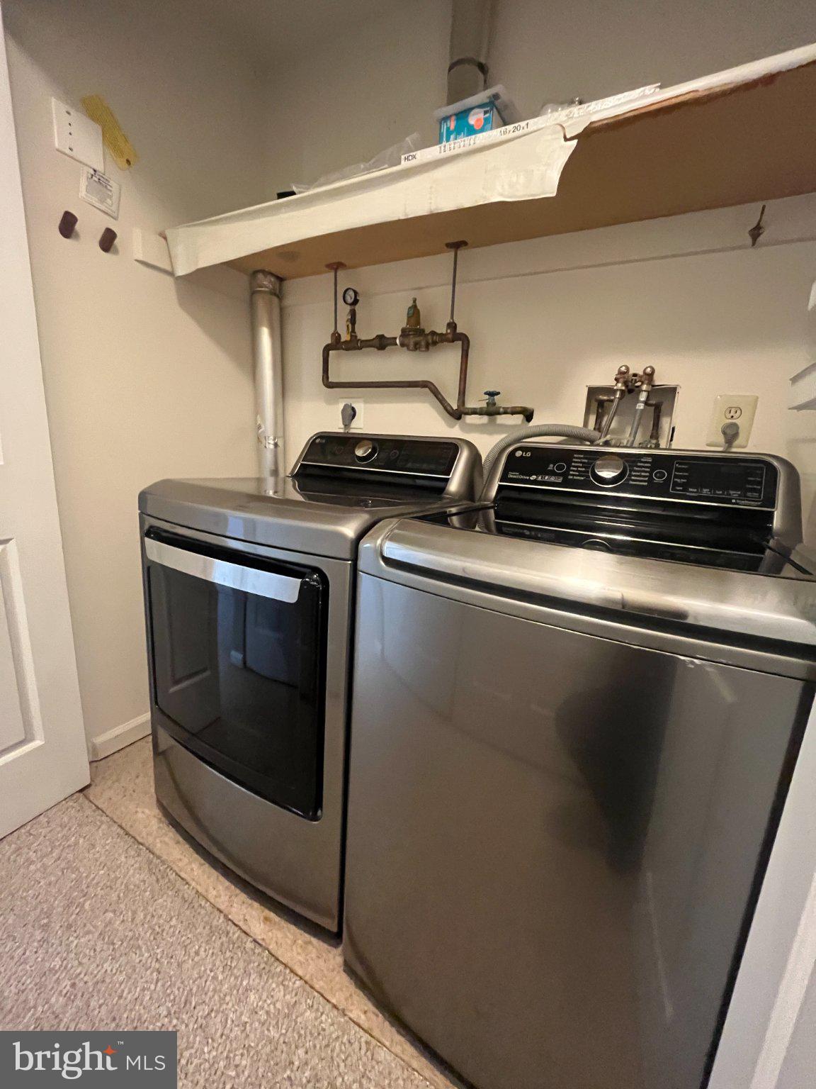 4 Rittenhouse Court, Unit 181 Chesterbrook, PA 19087 - Photo 19 of 22 Sleek laundry space with modern appliances.