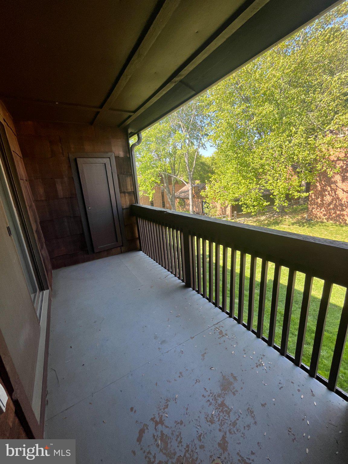 4 Rittenhouse Court, Unit 181 Chesterbrook, PA 19087 - Photo 20 of 22 Sunny balcony with lush greenery view.