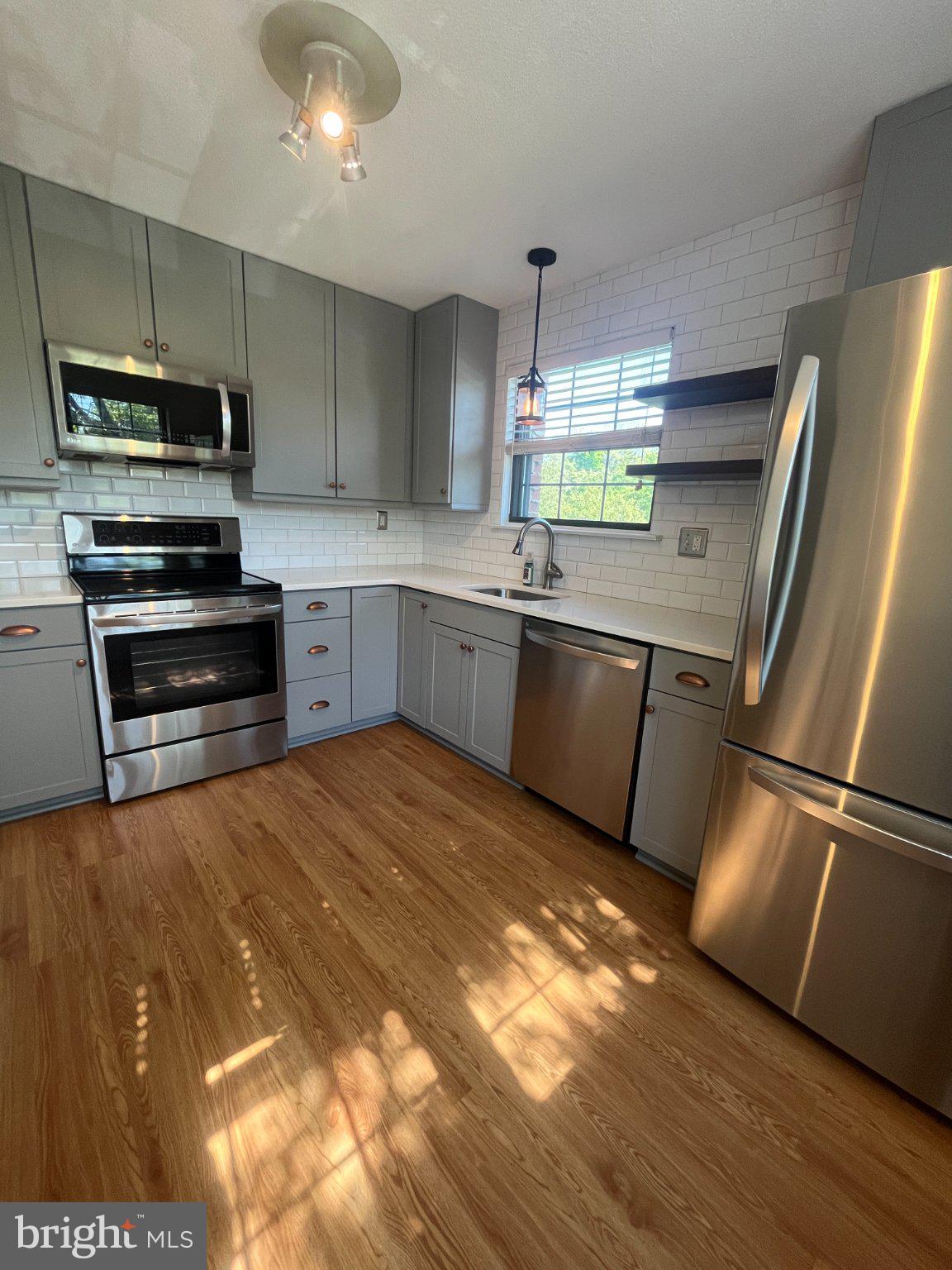 4 Rittenhouse Court, Unit 181 Chesterbrook, PA 19087 - Photo 6 of 22 Modern kitchen with sleek finishes.