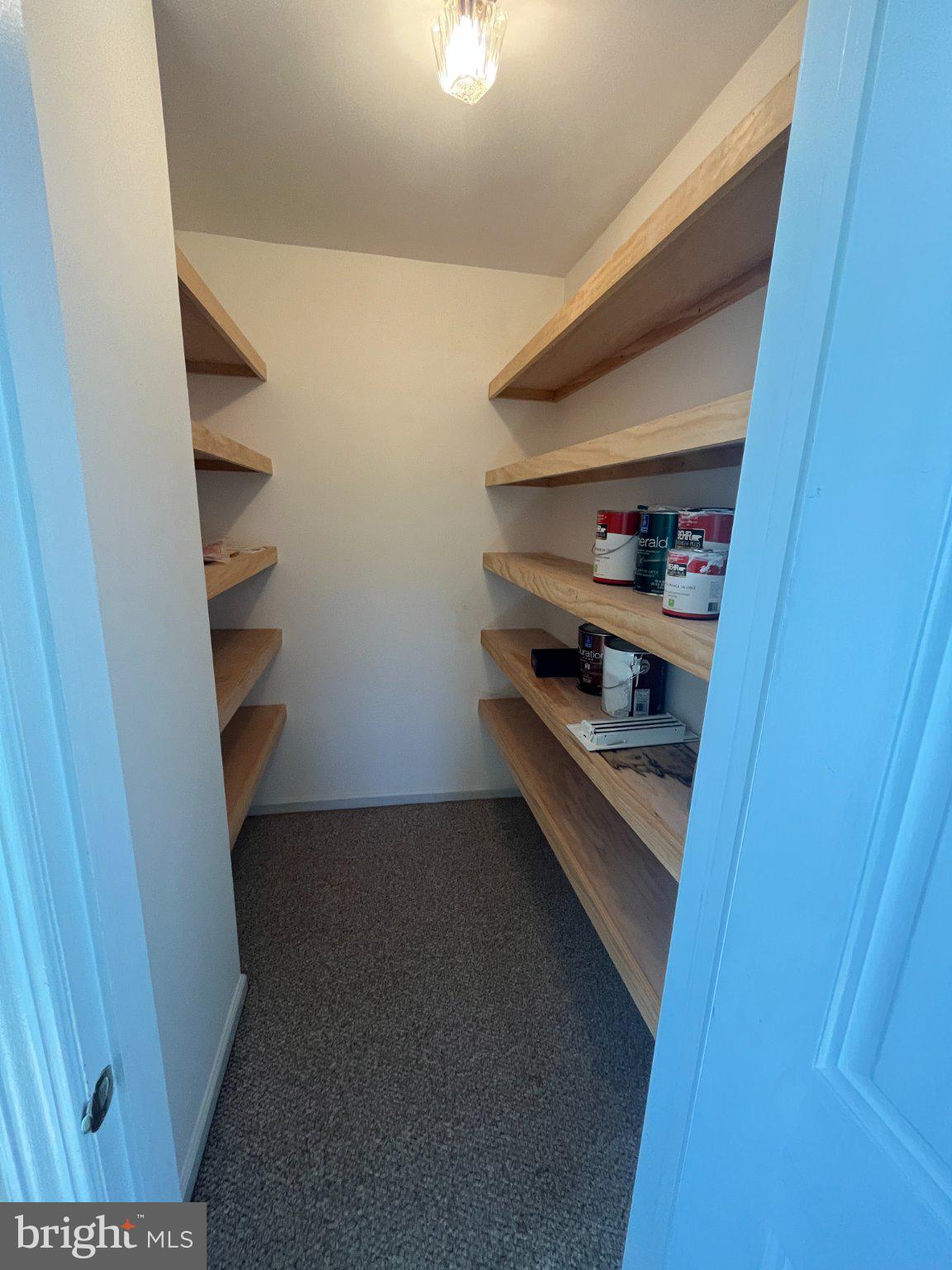 4 Rittenhouse Court, Unit 181 Chesterbrook, PA 19087 - Photo 7 of 22 Spacious pantry with open shelving.