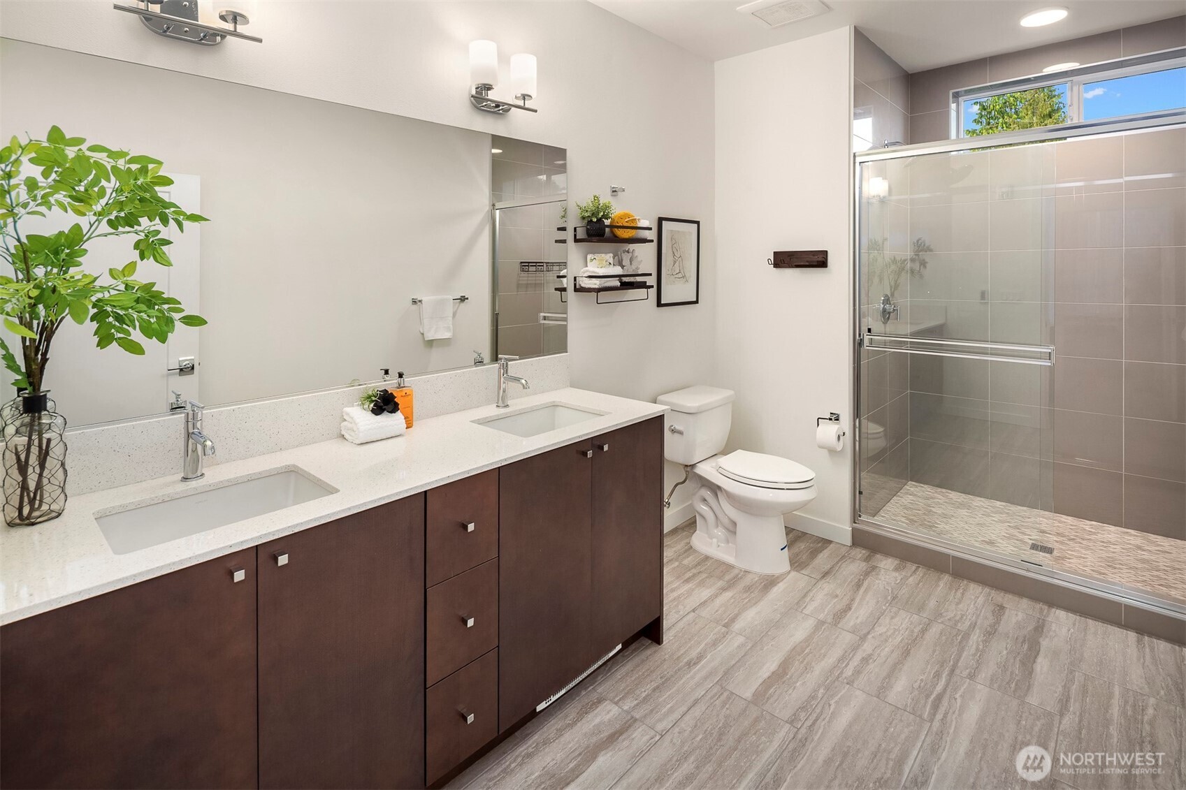 1494 Northwest 75th Street Seattle, WA 98117 - Photo 17 of 22 a bathroom with a sink a toilet and shower