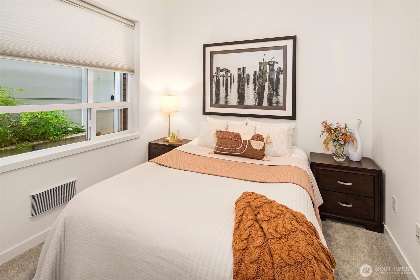 1494 Northwest 75th Street Seattle, WA 98117 - Photo 3 of 22 a bedroom with a bed and a window