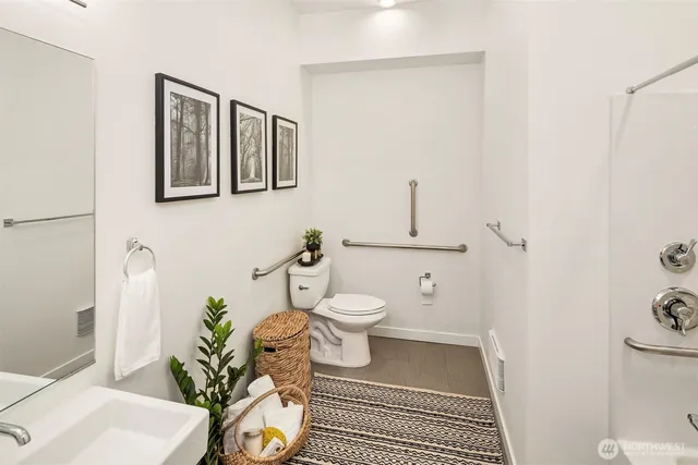 a bathroom with a bathtub and shower