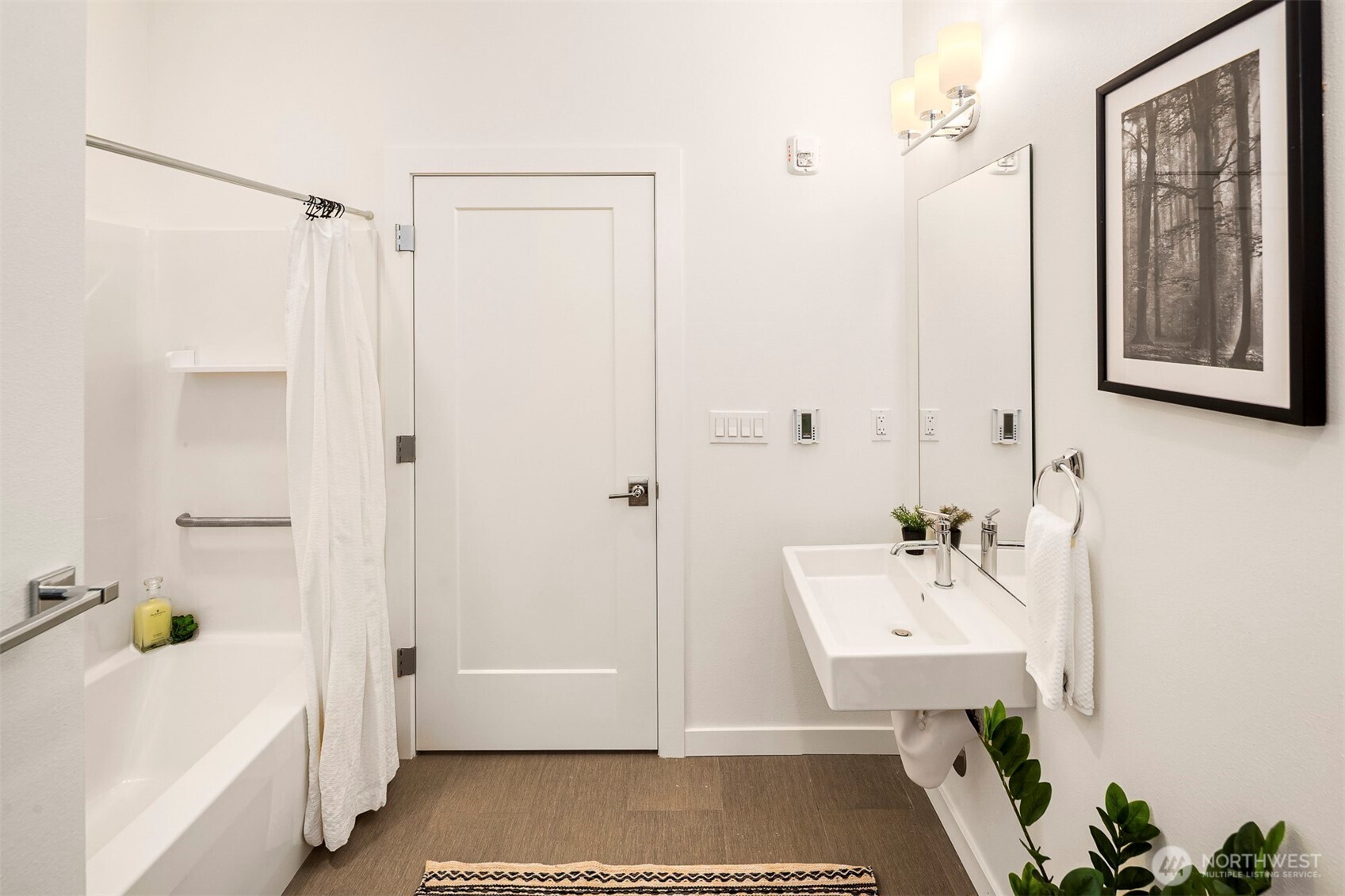 1494 Northwest 75th Street Seattle, WA 98117 - Photo 7 of 22 a bathroom with a bathtub and shower