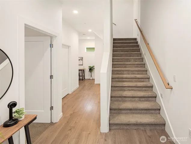 a view of a dining room with furniture and window