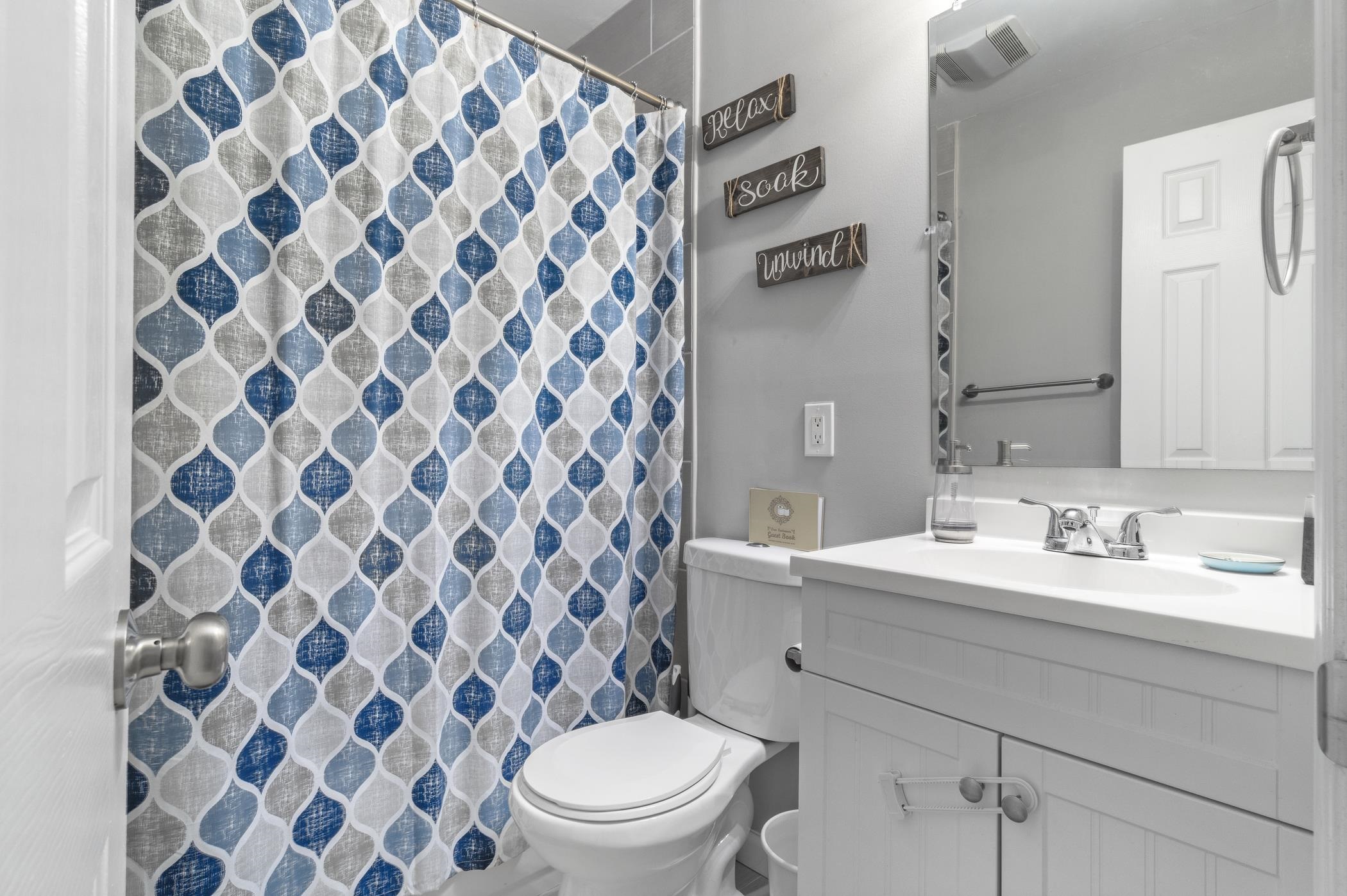 6 Haddon Road Somers Point, NJ 08244 - Photo 19 of 33 a bathroom with a toilet and a sink a mirror