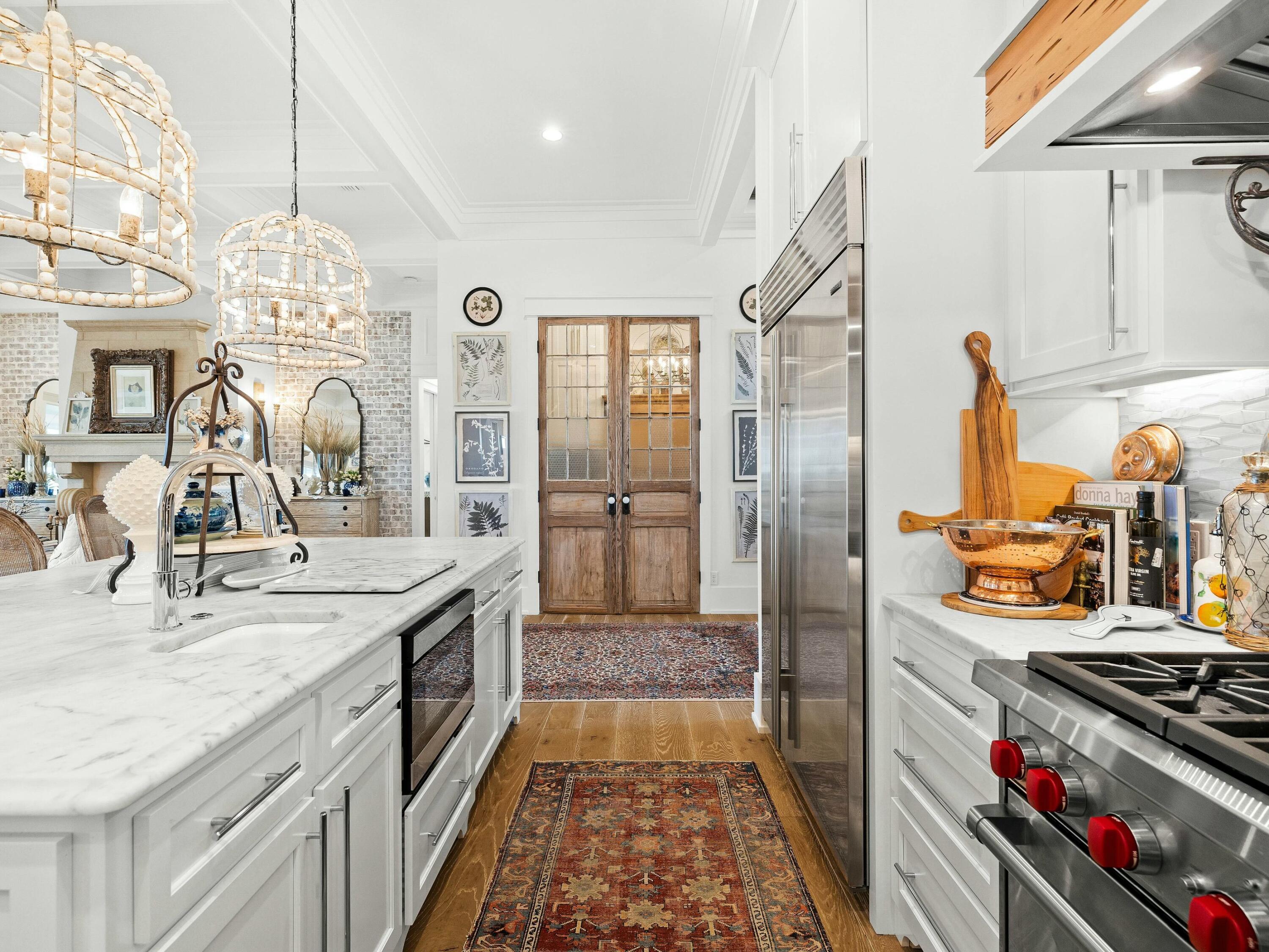 1521 Driftwood Point Road Santa Rosa Beach, FL 32459 - Photo 12 of 55 a kitchen with a sink stove and refrigerator