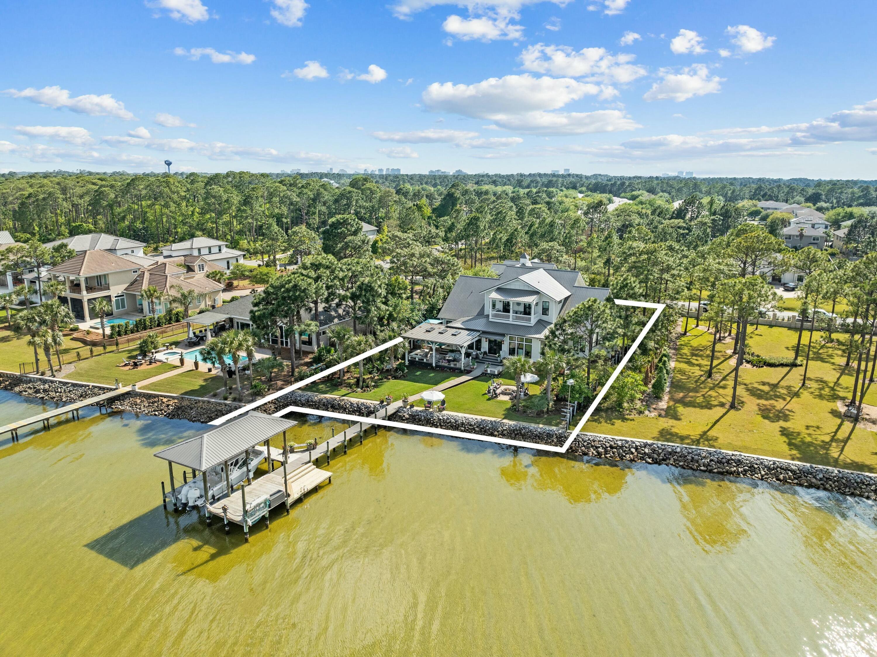 1521 Driftwood Point Road Santa Rosa Beach, FL 32459 - Photo 3 of 55 a view of a swimming pool with an ocean view