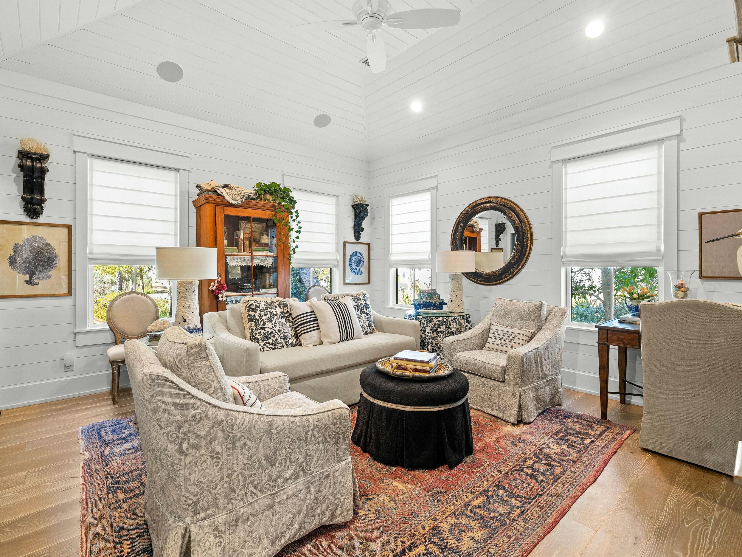 1521 Driftwood Point Road Santa Rosa Beach, FL 32459 - Photo 34 of 55 a living room with fireplace furniture and a large window