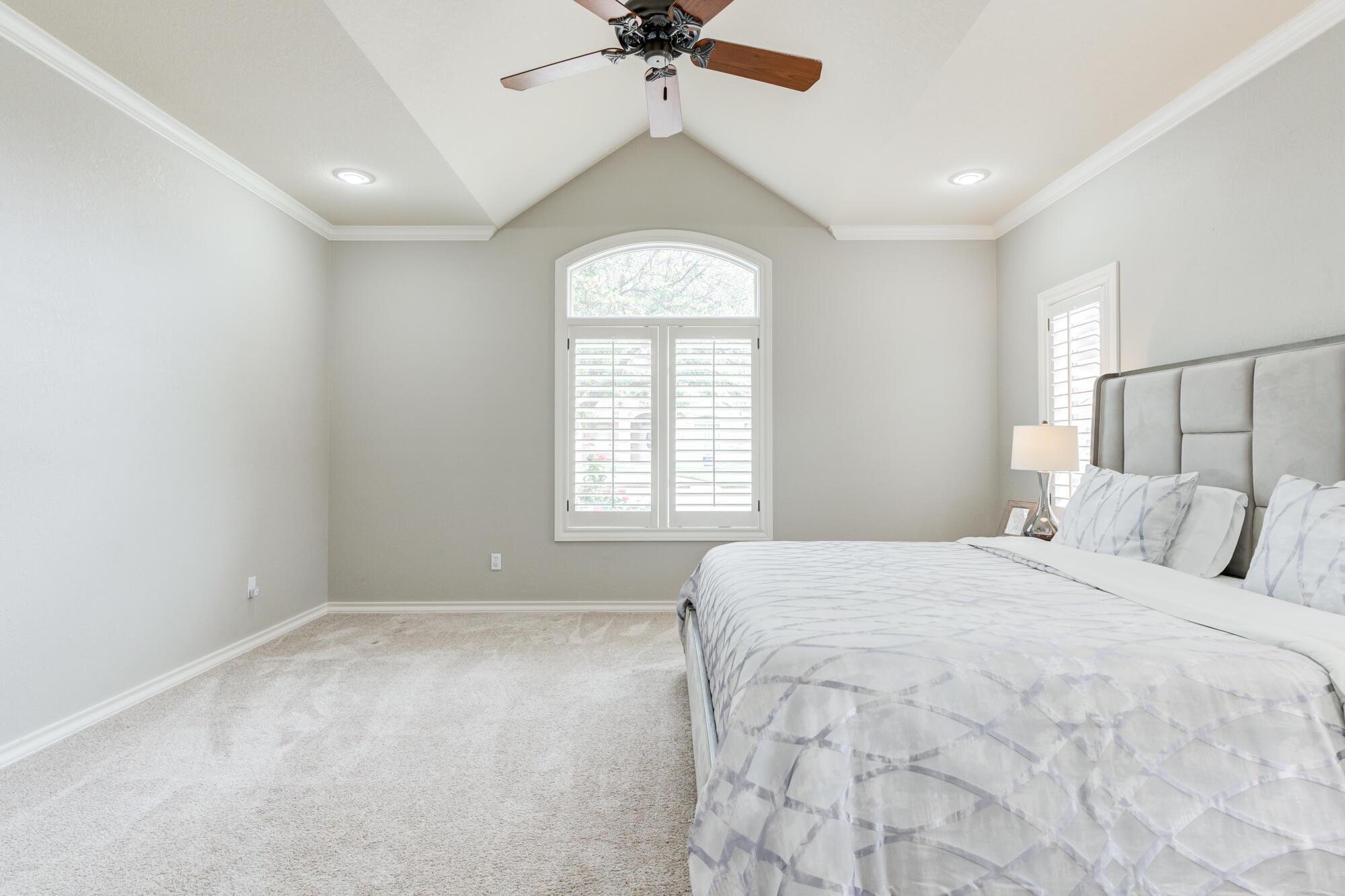6020 85th Street Lubbock, TX 79424 - Photo 25 of 58 a bedroom with a bed and window