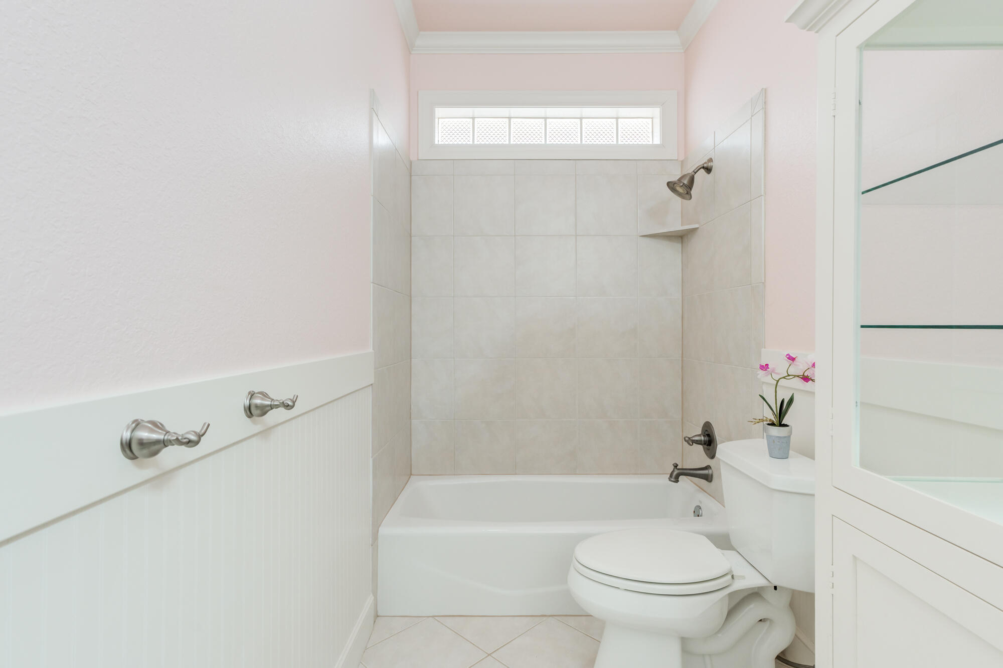 6020 85th Street Lubbock, TX 79424 - Photo 37 of 58 a bathroom with a sink a toilet and shower