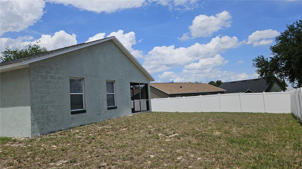 108 Brittany Road Mascotte, FL 34753 - Photo 16 of 17 a front view of a house with a yard