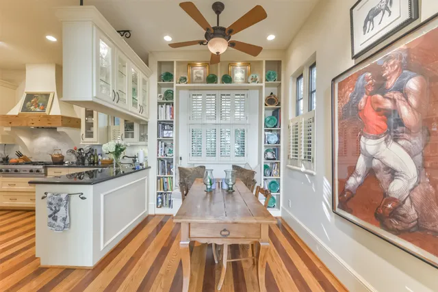 a spacious bathroom with a double vanity sink a mirror a bathtub and shower