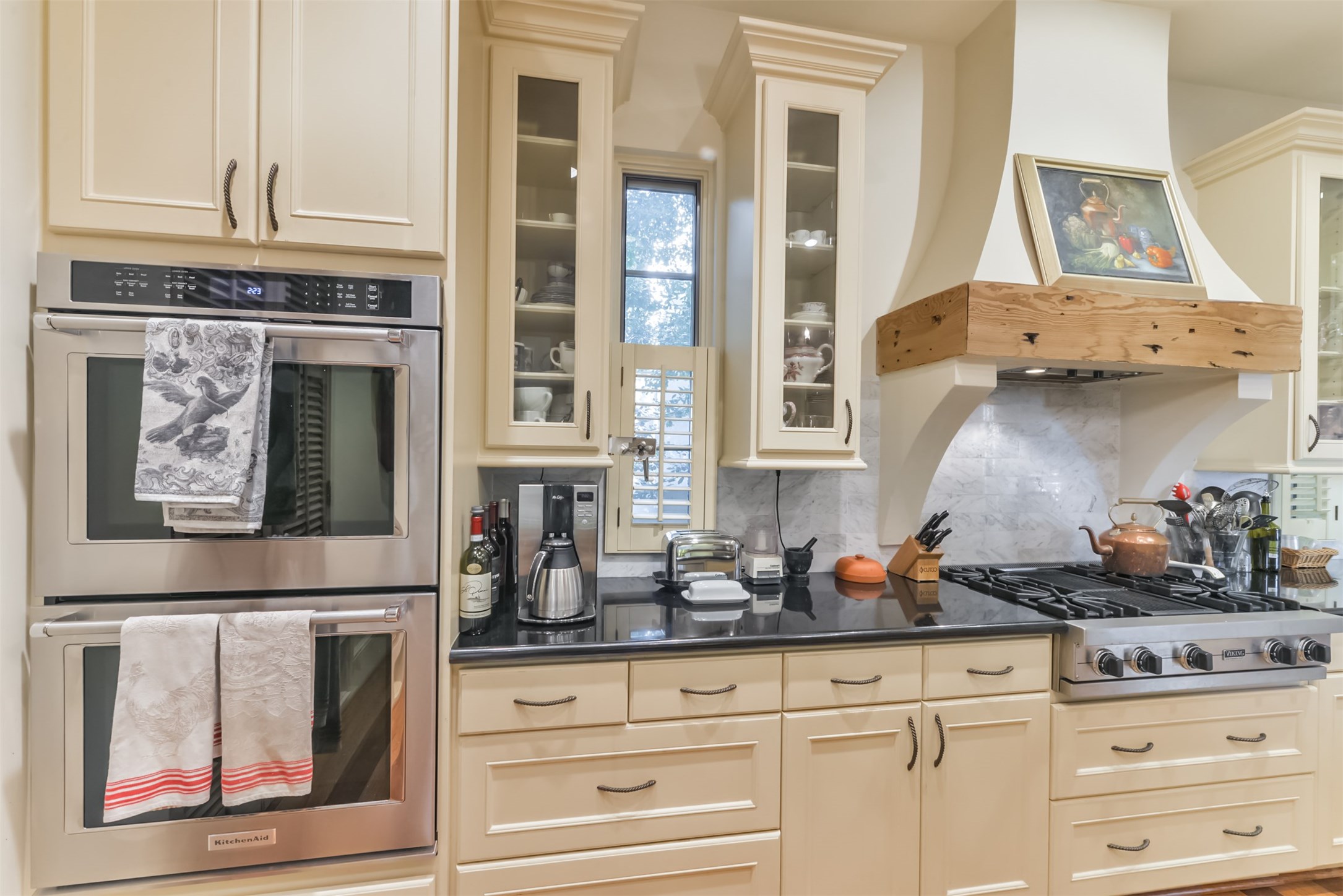 2712 Ferndale Street Houston, TX 77098 - Photo 17 of 49 a kitchen with stainless steel appliances granite countertop white cabinets and a granite counter tops