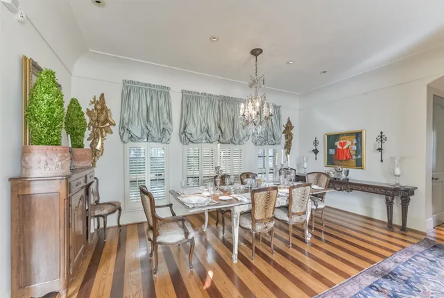 a view of a hallway with closet and bathroom
