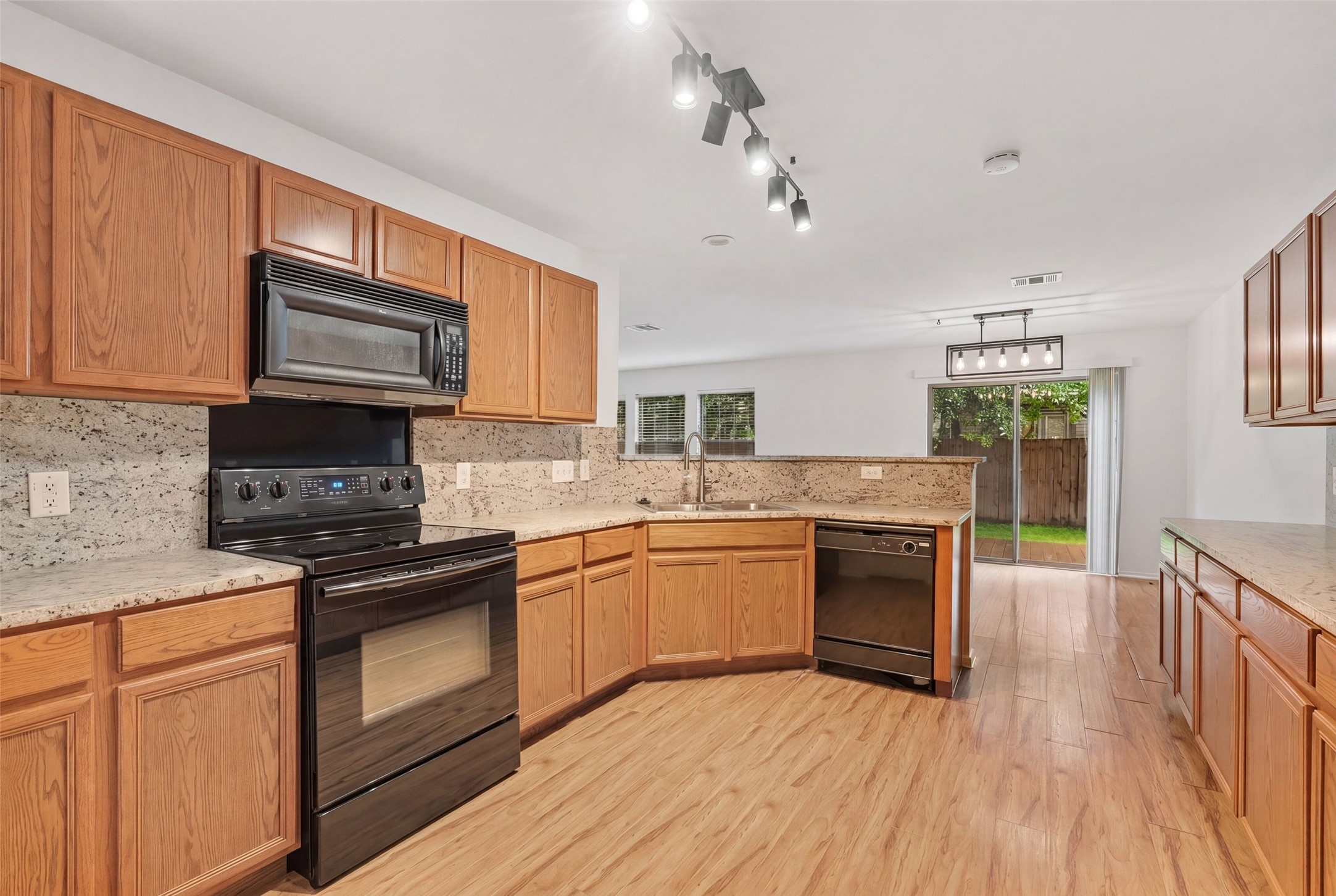 6629 Doyal Drive Austin, TX 78747 - Photo 13 of 37 The kitchen has brand new countertops