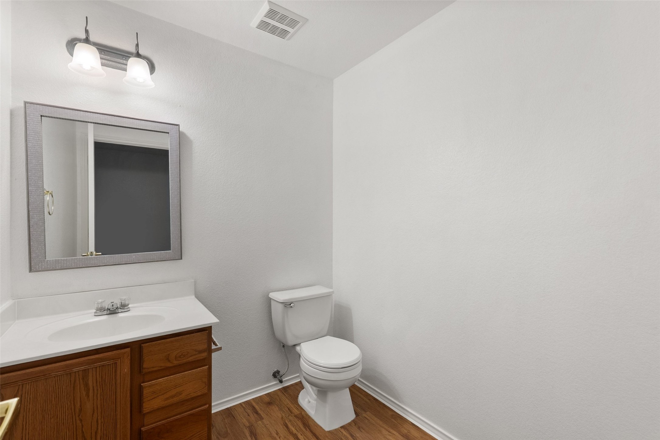 6629 Doyal Drive Austin, TX 78747 - Photo 5 of 37 Half bathroom downstairs for you and your guests