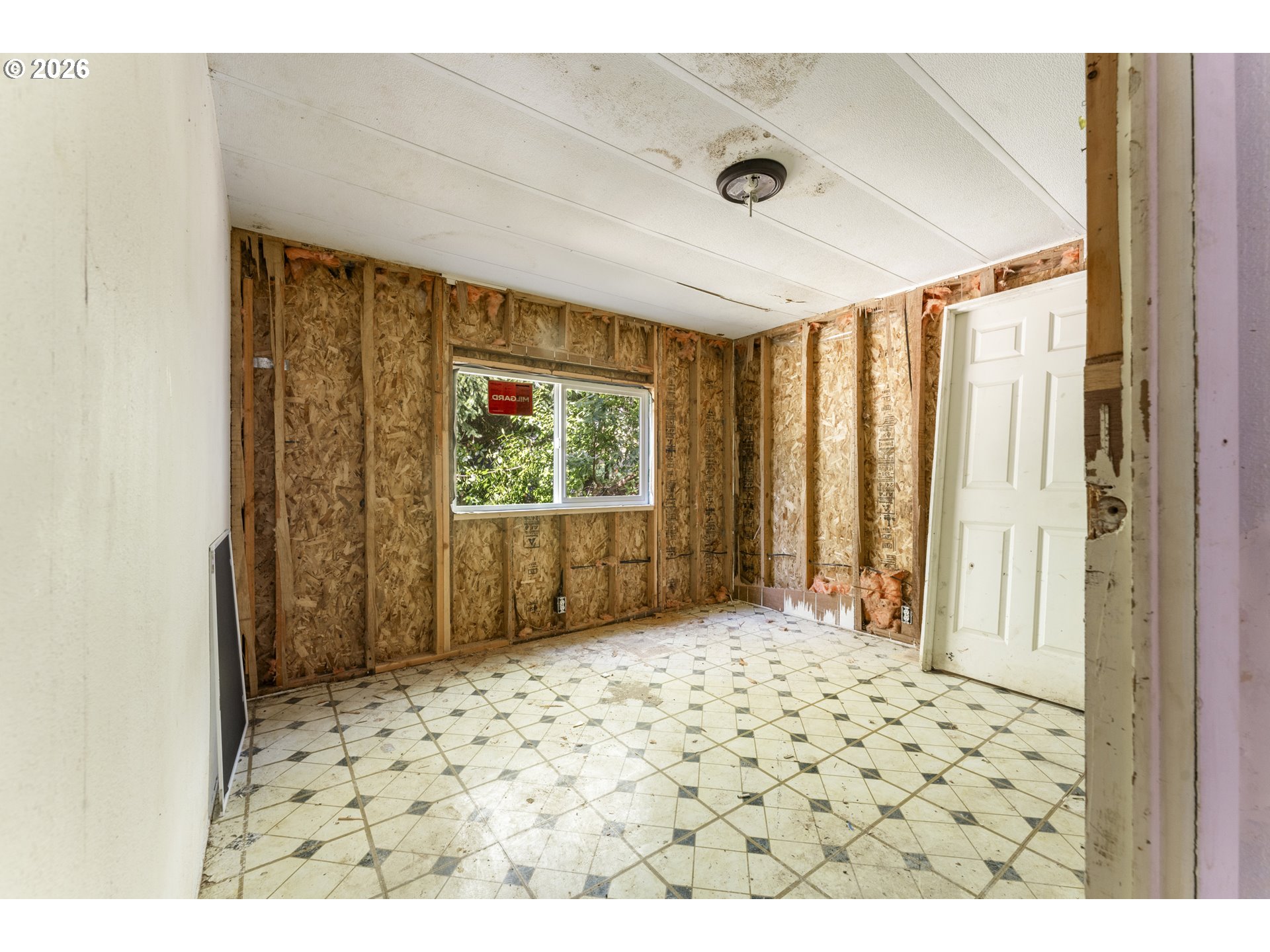 61912 Olive Barber Road Coos Bay, OR 97420 - Photo 15 of 31 a view of a bathroom with a window